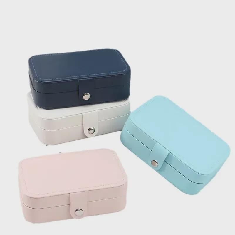 Exquisite Portable Jewelry Box: Compact Travel Storage for Earrings, Rings, and Necklaces.