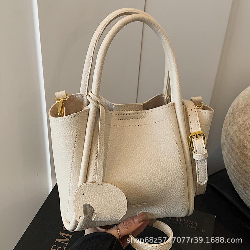 Lychee bucket bag women's new niche texture hand-to-hand shoulder crossbody bag high-end fresh vegetable basket bag