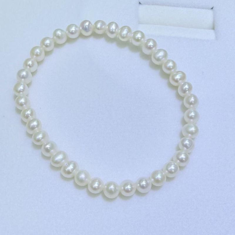 Zhuji Freshwater Pearl Bracelet: 4.5-5mm Near Round Pearls on a Durable Leather Cord