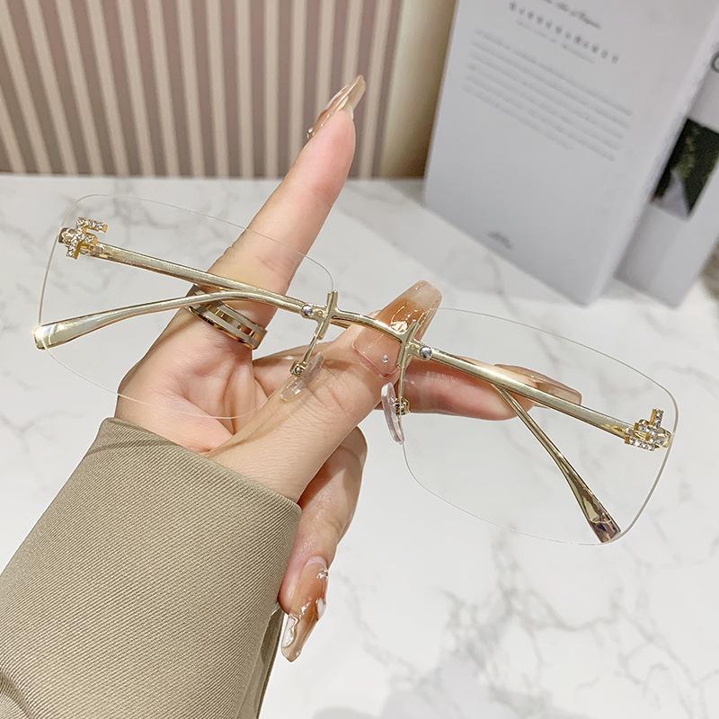 Ruiao rimless sunglasses UV400 fashion square metal glasses for women luxury brand designer diamond y2k small face sun glasses