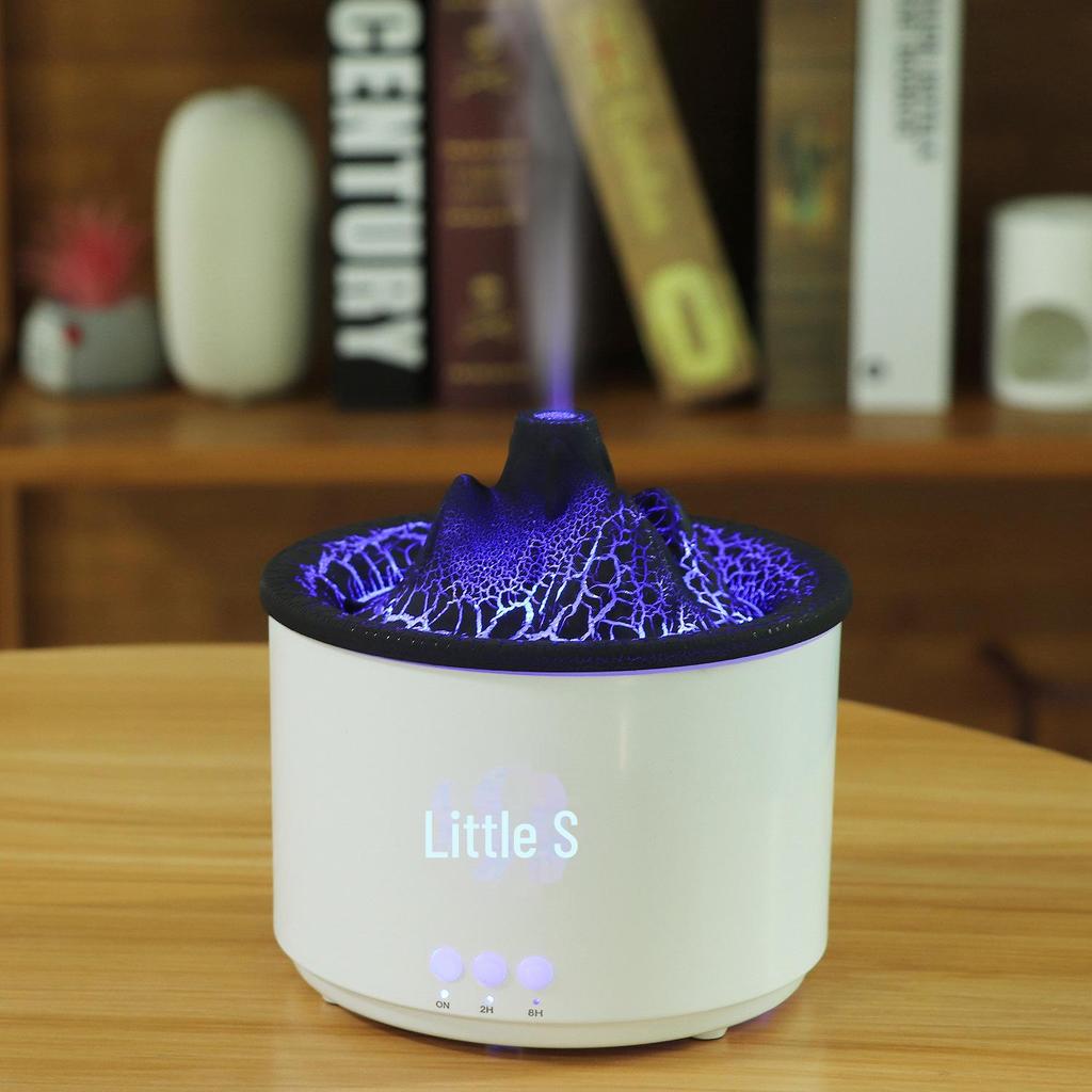 Compact Volcano Aromatherapy Humidifier: 400ml Desktop Water Oxygen Machine with Small Hollow Design and Crack Simulation.