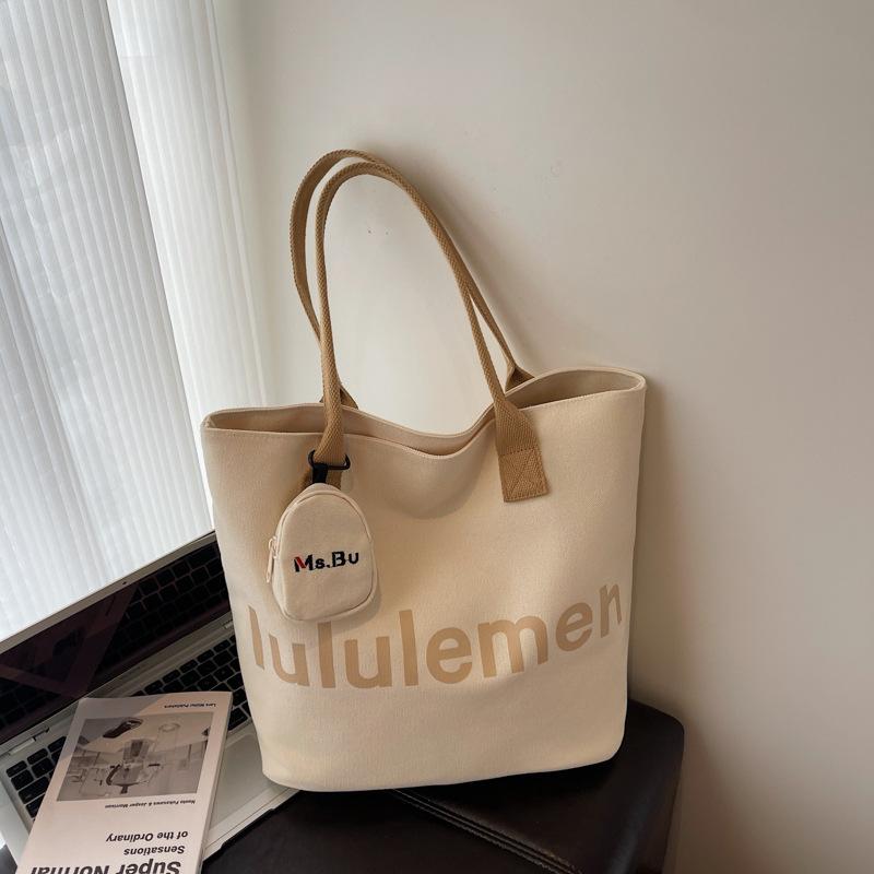 2025 summer new canvas bag shopping bag lazy wind tote bag commuter large capacity cloth bag portable shoulder bag