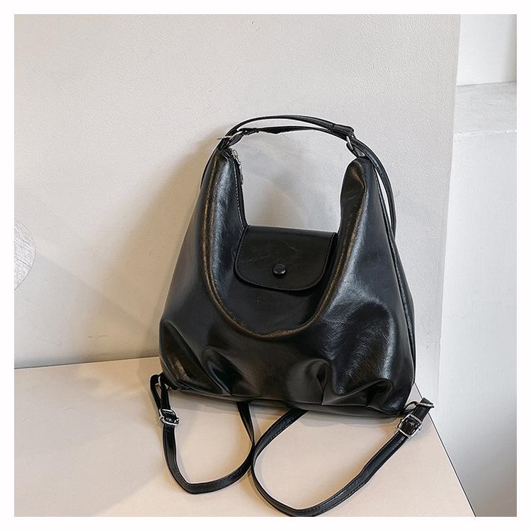 

2024 Autumn/Winter Women s Retro Commuter Bag: High-Capacity Backpack & Single Shoulder Tote чорний