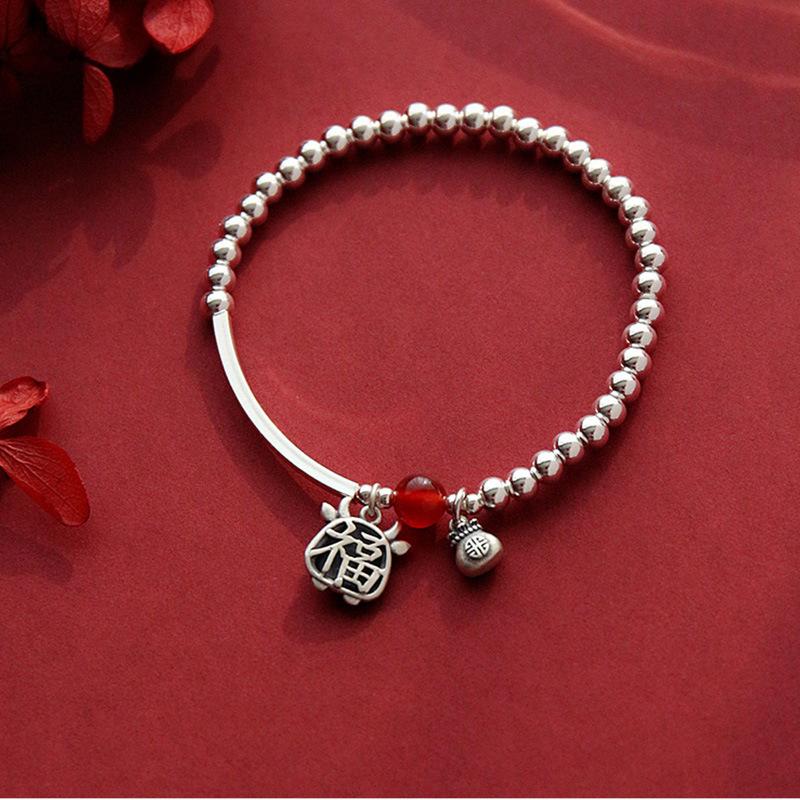 Silver bead blessing character natal cow bracelet female niche design light luxury retro exquisite advanced new