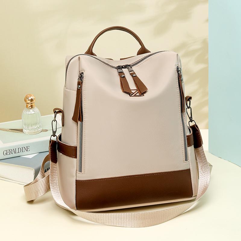 Schoolbag Backpack Women's 1011 New Trendy Simple Versatile Oxford Fabric Lightweight Large Capacity Travel Women's Commuter Shoulder Backpack