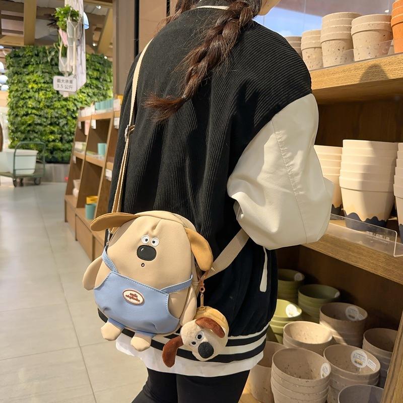 Small backpack female ins new cute cute cute big nose puppy cartoon bag girl soft heart oblique span bag
