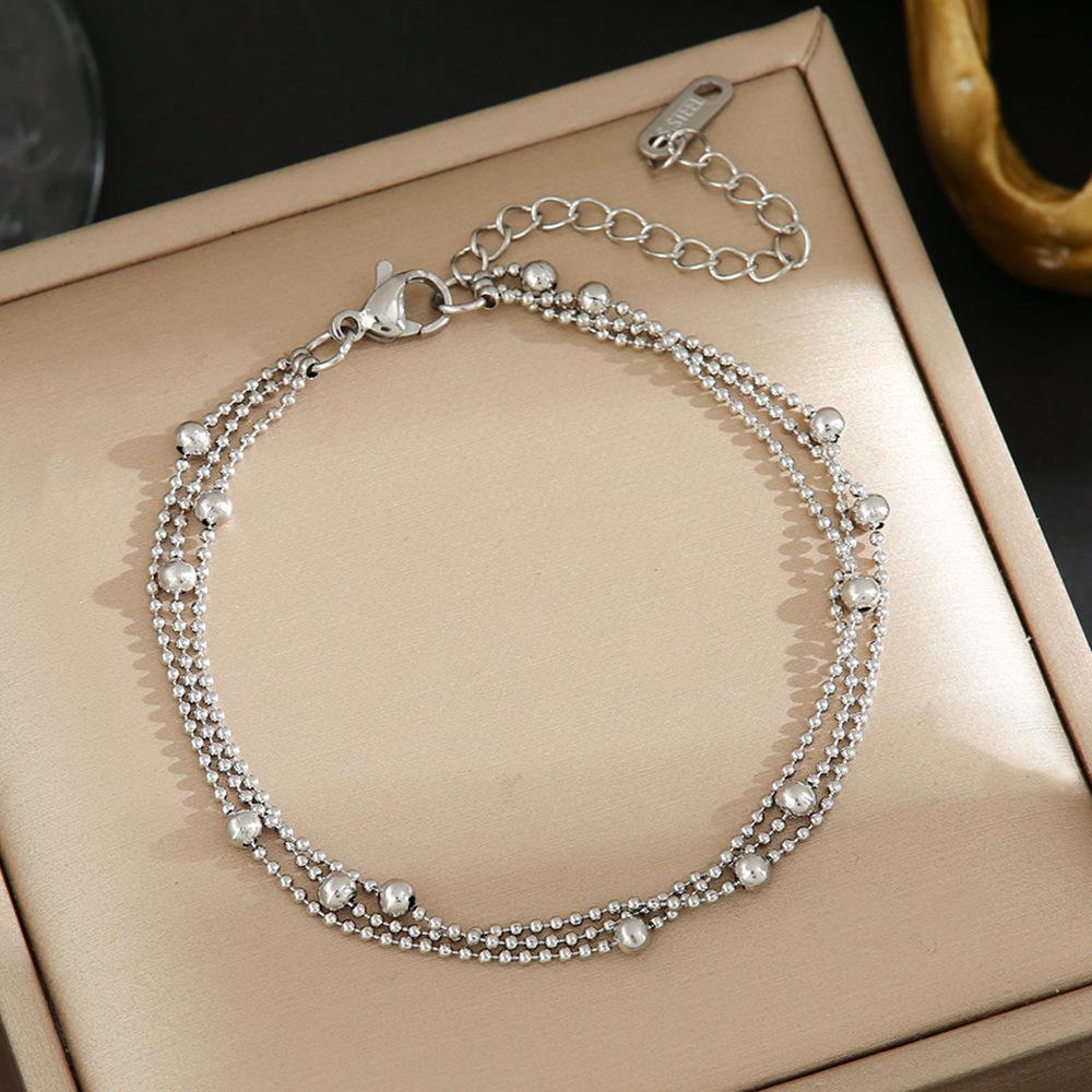 Colorfast Korean-Japanese Titanium Steel Women's Bracelet - Versatile, Fashionable Hand Jewelry.