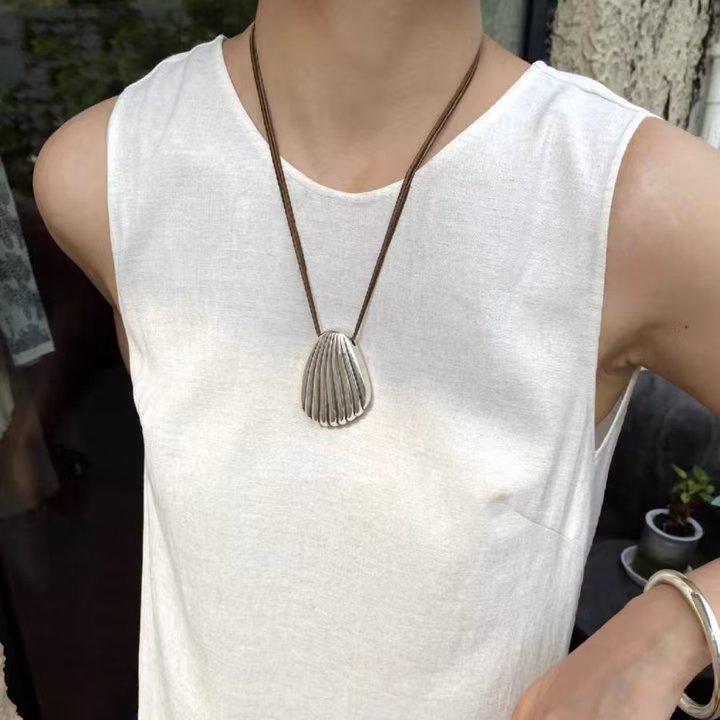 Elegant Silver Seashell Pendant Necklace with Brown Leather Cord