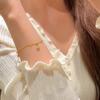 Gold Double-Layer Star Pendant Bracelet for Women - Small Wrist Design, Unique & Elegant.