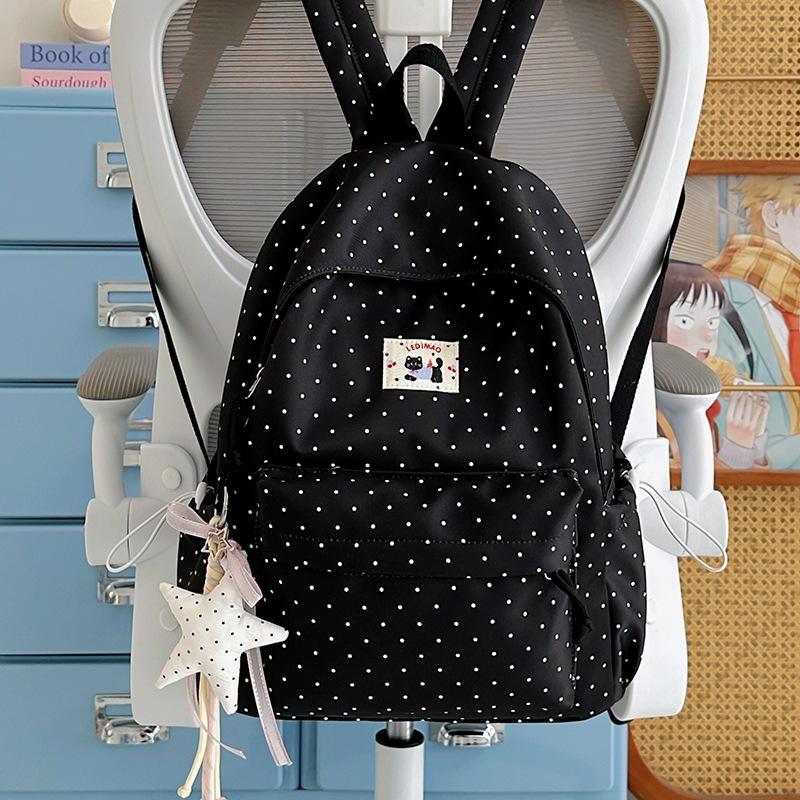 School bag: new elementary school backpack, girls' middle school students, high aesthetic value, INS style, niche, cute polka dot lightweight backpack