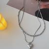 Double-Layered Heart Necklace In Silver: Stylish, Cool, and Trendy Choker with a Niche Design for Women.