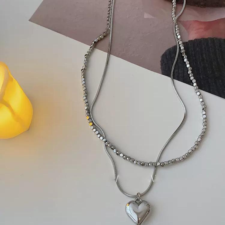 Double-Layered Heart Necklace In Silver: Stylish, Cool, and Trendy Choker with a Niche Design for Women.