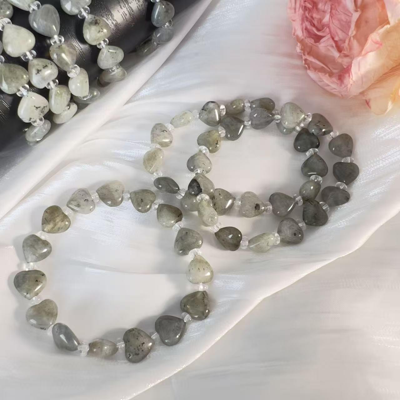 

Натуральний браслет-серце з полуничного кварцу з гранованими намистинами у формі серця Natural Crystal Bracelet