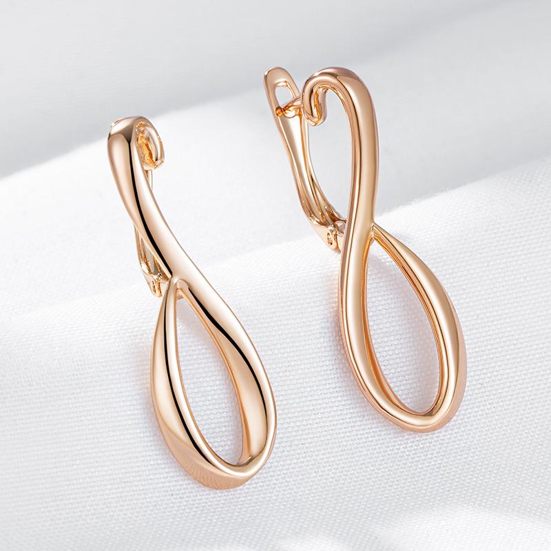 Neue Rosegold Farbe Lange Ohrringe Damen Einzigartig Kreativ Hohl Metall Glänzend Hängende Ohrringe Ethnisch Hochzeits Schmuck