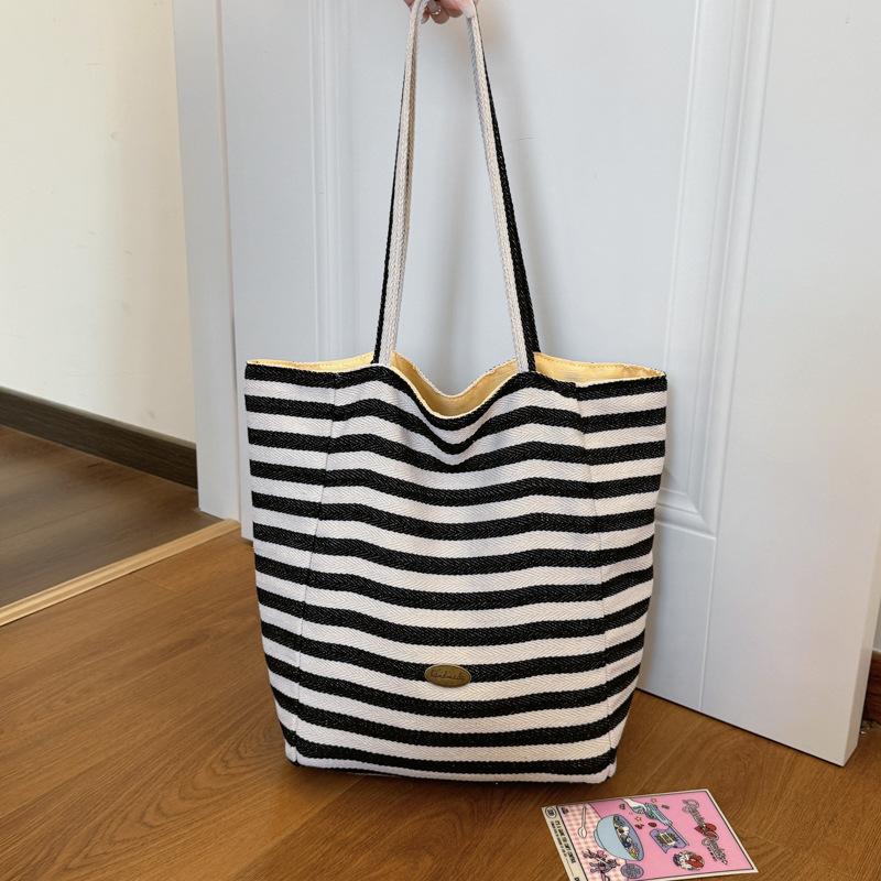 Gestreifte kontrastfarbene Canvas-Tasche 2025 neue koreanische Ins-Freizeittasche einzelne Schulter große Kapazität Tragetasche Einkaufstasche