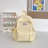 Schoolbag small fresh student schoolbag female Japanese cute solid color simple primary and secondary school student backpack leisure travel backpack