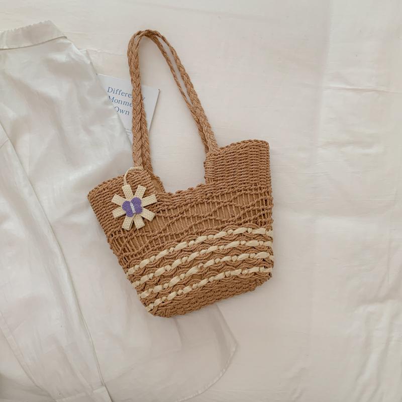 Handwoven Natural Fiber Tote Bag with Braided Handles and Open Weave Design