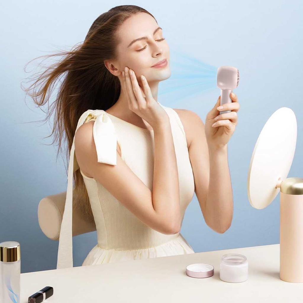 Handheld small fan, bladeless cold air, portable and portable mini USB charging, silent electric fan