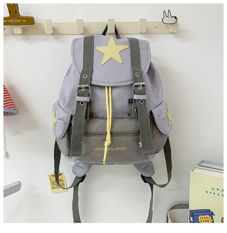 Schultasche neues koreanisches Nischen-Design Sternen-Rucksack Damen leichter Reise-Rucksack kleiner Studenten-Freizeit-Rucksack