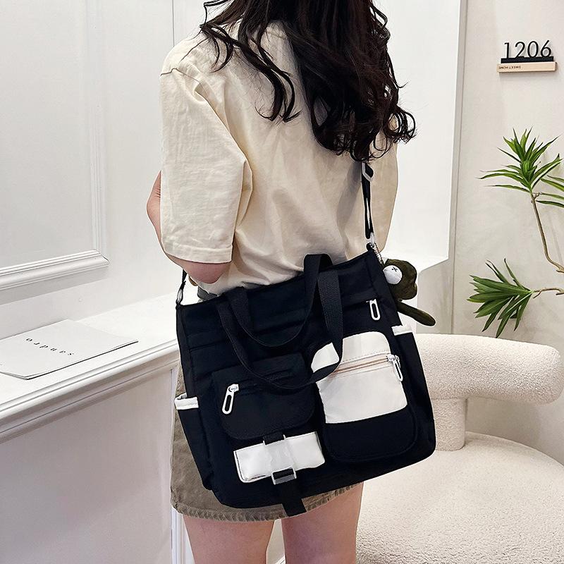 Large capacity bag female messenger ins wind Japanese college students class shoulder bag versatile literary tote bag