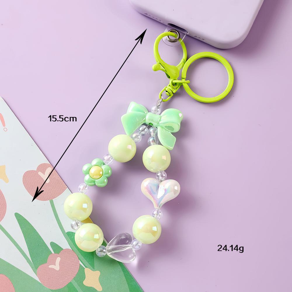 Позолоченный Брелок-Подвеска в виде Сердечка с Бантом и Цветочком из Бусин зелёный