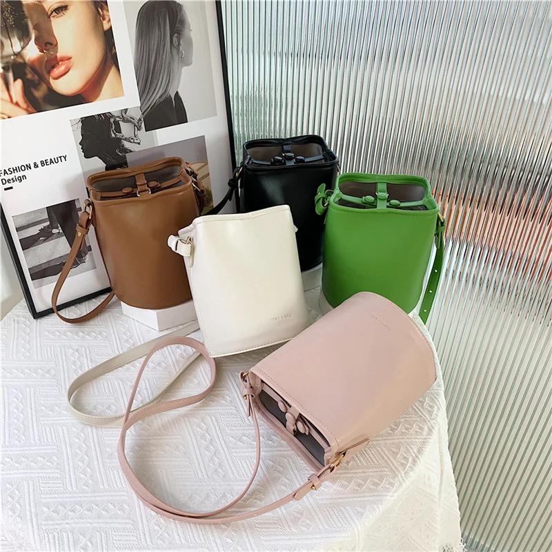 Women's PU Leather Crossbody Bags Contrasting Colors Casual Solid Trendy Lock Bucket Type