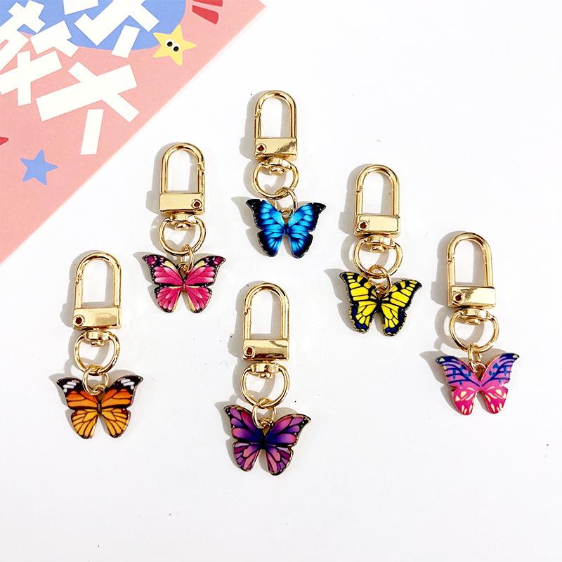 Kreativer Mini-Schmetterling Schlüsselanhänger Anhänger - Stilvolles Accessoire für Damenhandtaschen & Autoketten