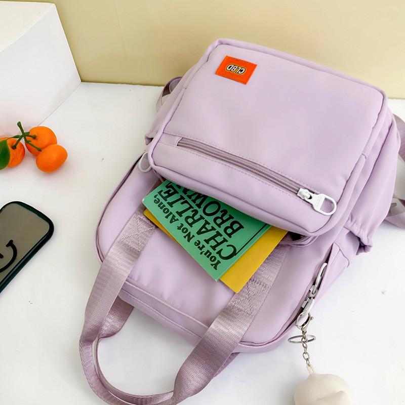 Unisex Primary School Student Backpack Waterproof Handbag With Colorful Patchwork Design