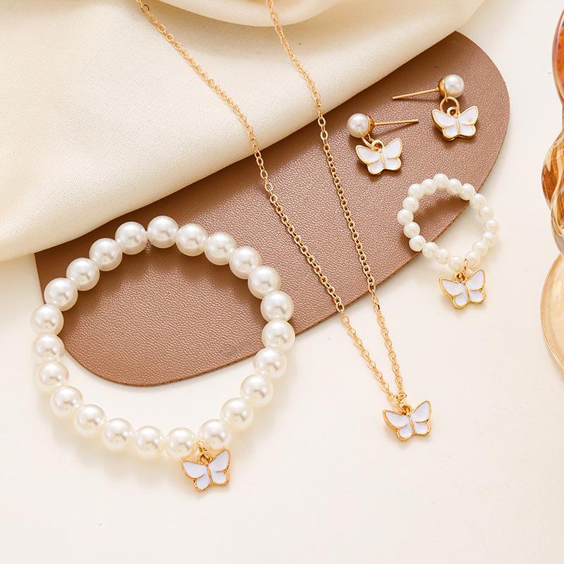 Charming Pearl Butterfly Jewelry Set: Necklace, Earrings, Ring & Bracelet