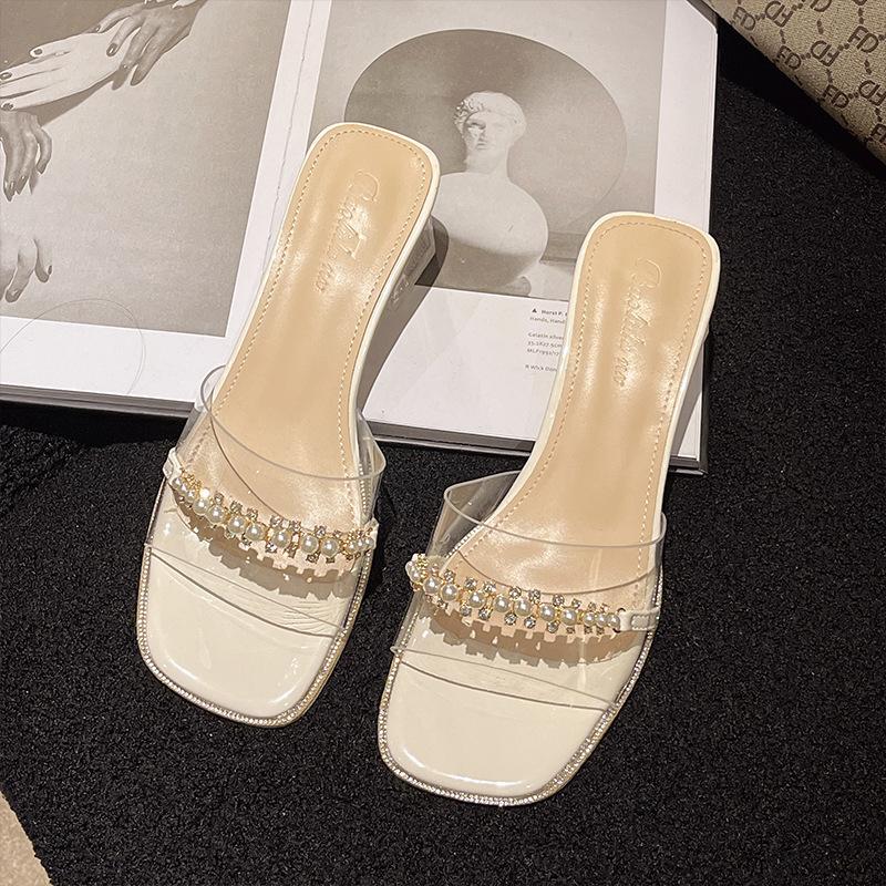 

Transparent slippers women s rhinestone pearl outer wear one-word drag summer new versatile crystal thick heel high heel sandals 35 бежевый
