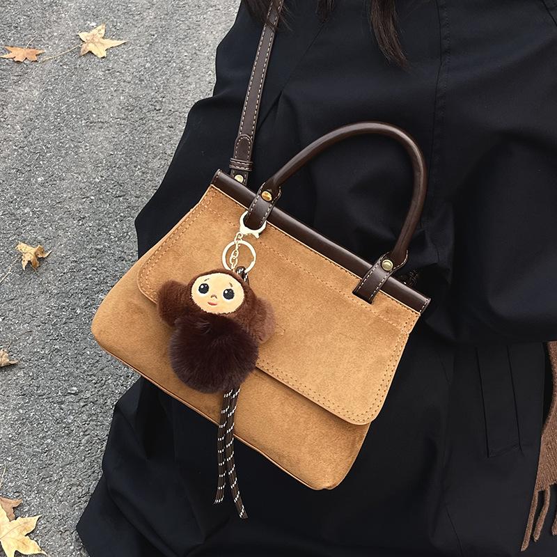 Autumn and winter explosion French retro high-end suede handbag niche commuter fashion messenger women's bag