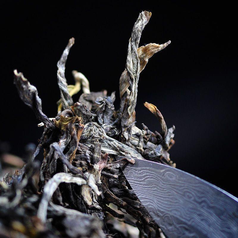 Pu-erh Raw Tea Yunnan Ancient Tree Pure Material Seven Seed Cake Spring Tea 200g