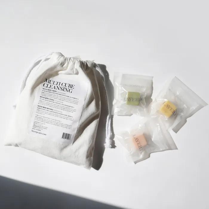 A Soothing Moisturizing Layering Cube That Builds Up Like Vitamins On the Skin. 160g Cream Soothing Barrier Composition and Cotton Pouch and Bubble