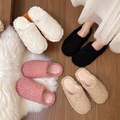 Pantoufles en laine d'agneau pour femmes 2025 nouveau hiver version coréenne à semelle plate chaussures Muller paresseuses à tête de sac en velours demi-traînage