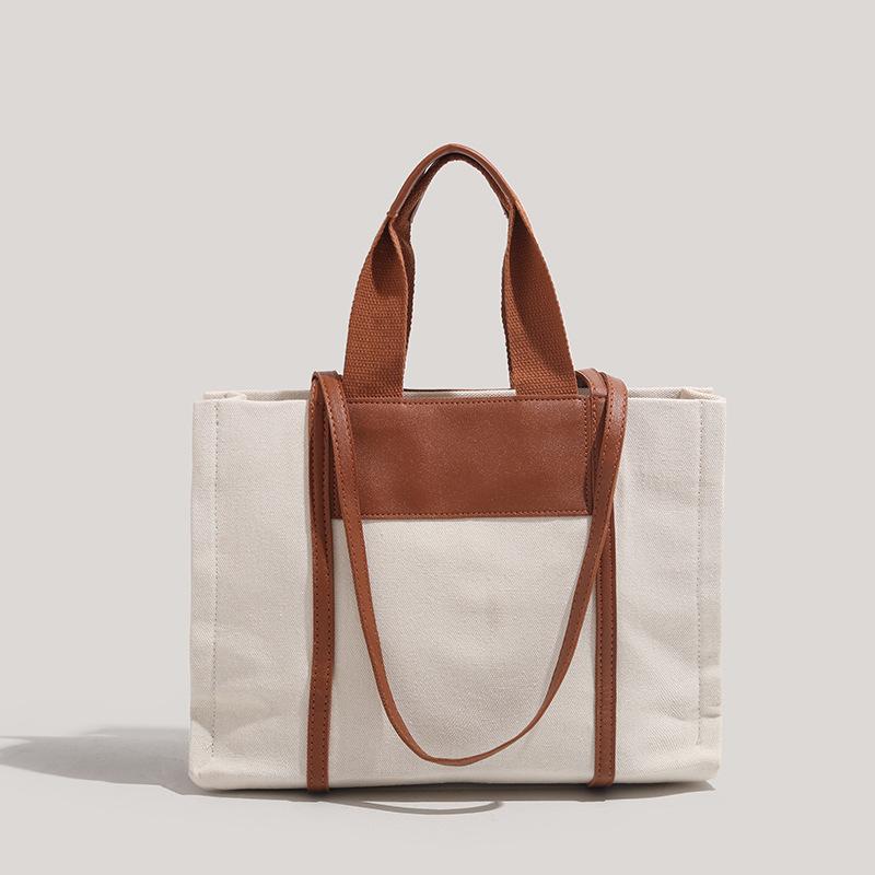 Portable canvas large bag women's large-capacity new high-end commuter shoulder bag fashion