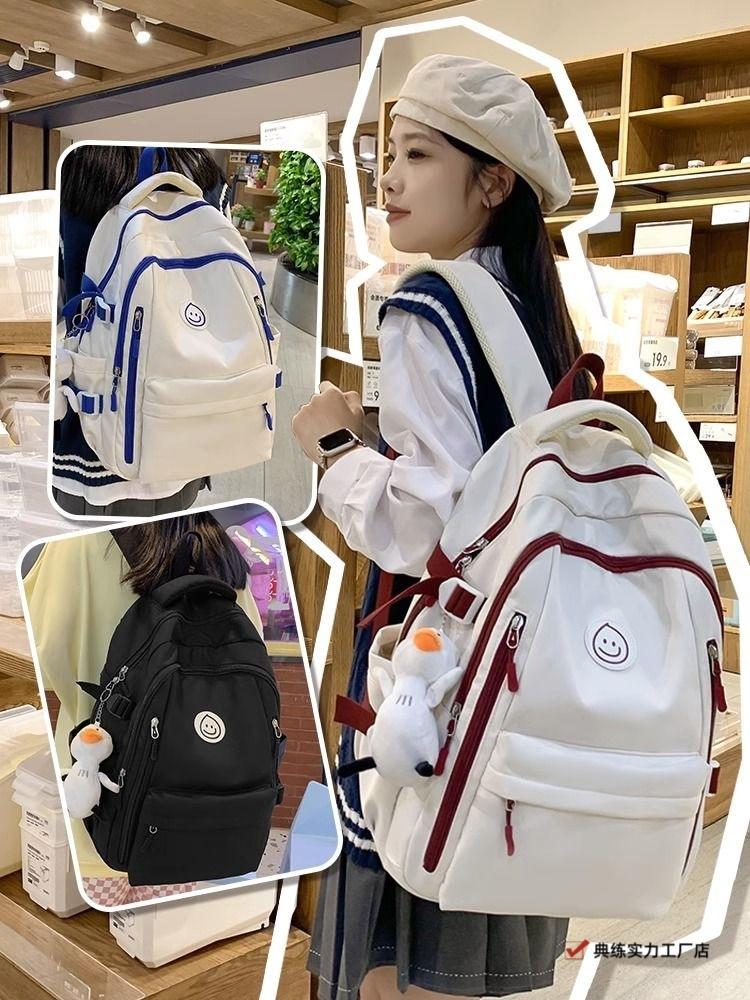 School bag Large capacity computer bag Backpack Boys and girls University campus Simple high junior high school students High value handsome