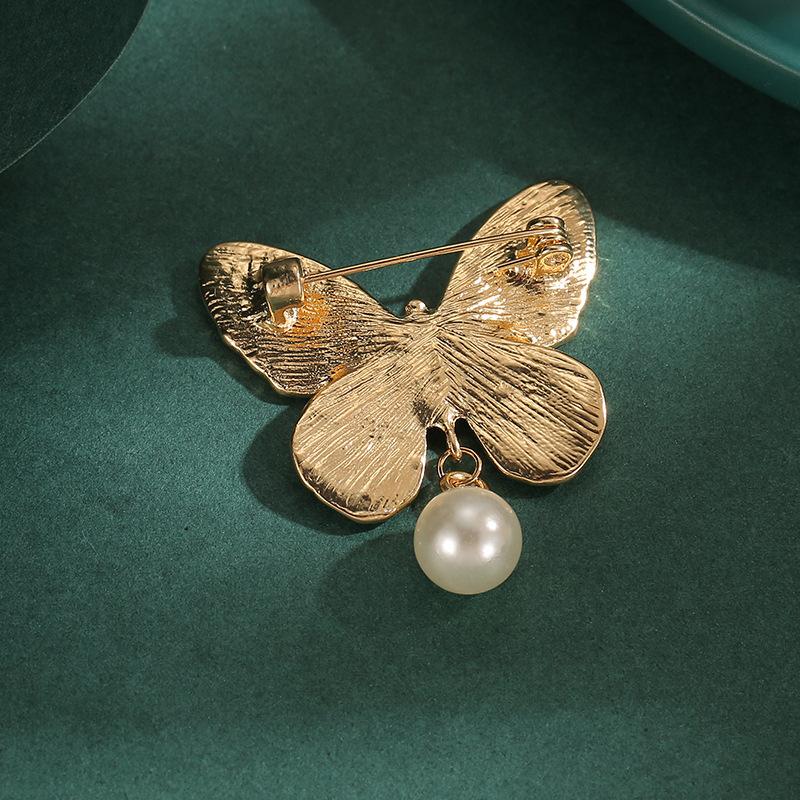 French butterfly brooch high-end sense light luxury personality niche high-end women's retro pin suit accessories