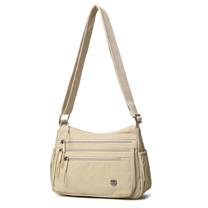 Dameskulderveske med stor kapasitet og lett vekt