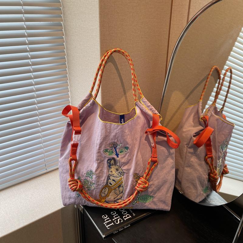 

Ленивый ветер новая сумка большой вместимости женская летняя универсальная сумка-тоут для студенток фиолетовый