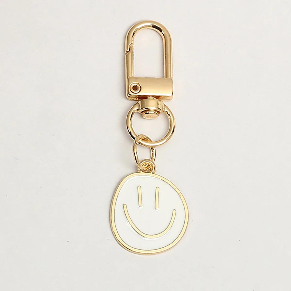 

Lovely Smile Face Keychain Cute White Purple Yellow Pink Blue Black Enamel Metal Key Ring Bag Pendant Accessories Women Girl CLE белый