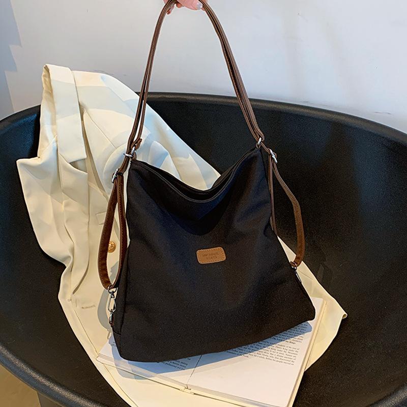 

Fashion canvas shoulder bag women s autumn trendy new large-capacity backpack commuting class tote bag чорний