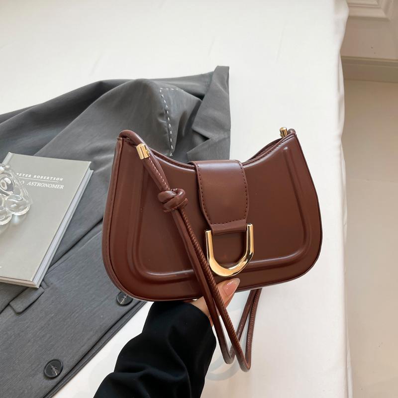

Versatile bag women s 2025 spring and summer new crescent-shaped saddle bag high-end chain shoulder bag fashion women s bag коричневый