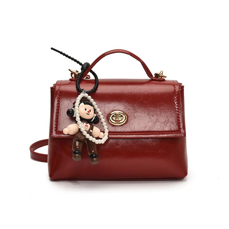 French simple high-end temperament oil wax leather portable small square bag women's commuting versatile solid color casual style messenger bag