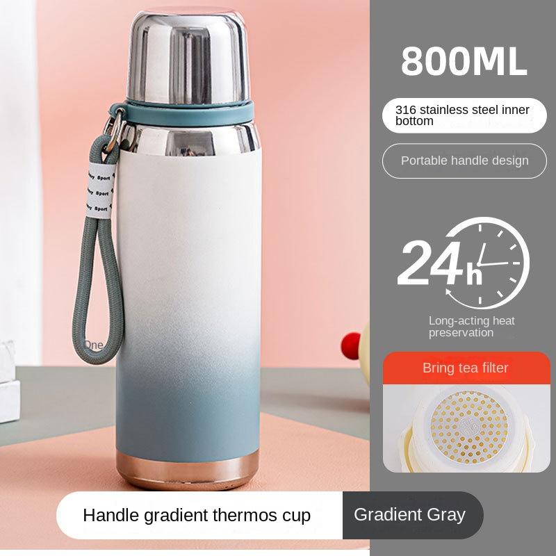 Ein-Tassen-Doppeldeckel-Vakuumbecher 316 Edelstahl Studenten-Wasserbecher Geräumig Tragbar Seilschlaufe Mädchen Gutaussehend Farbverlauf