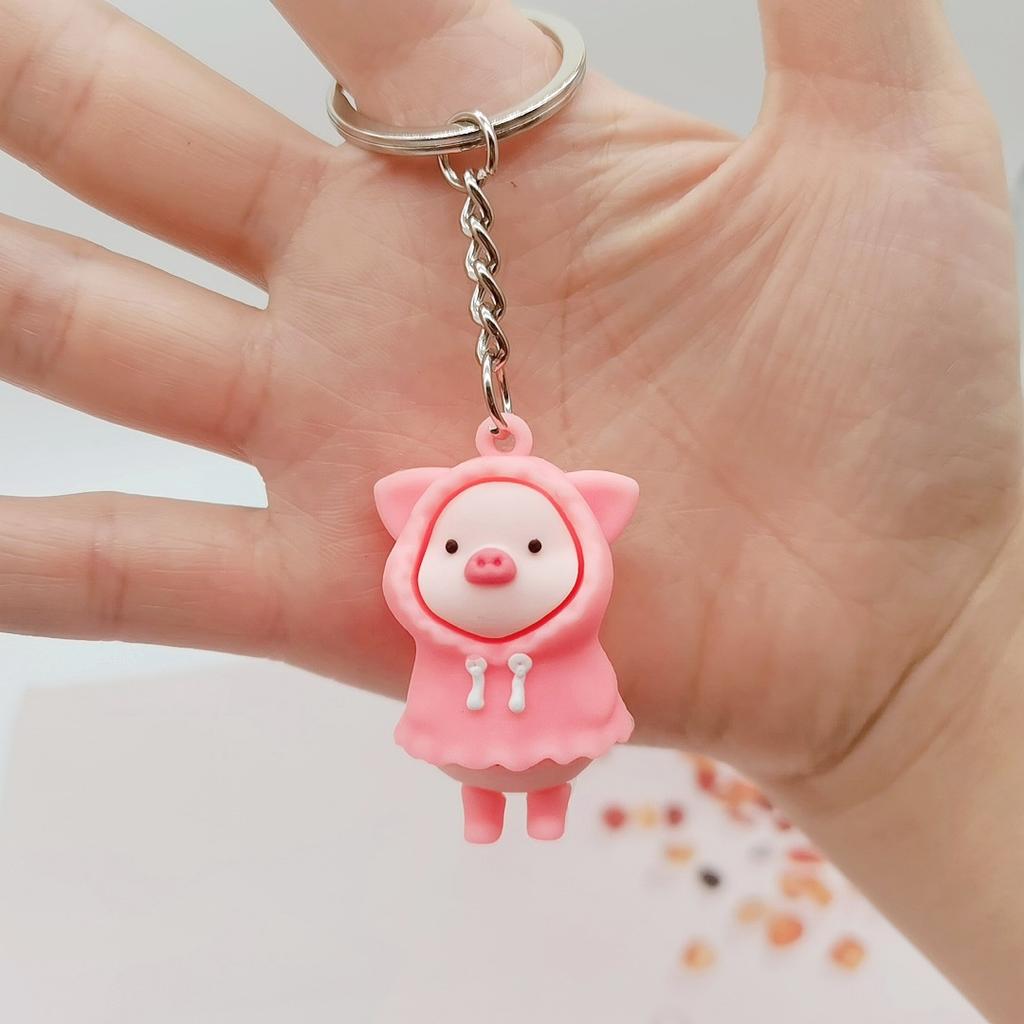 2021 Ny tegneserie regnfrakk Piggy nøkkelring PVC myk nøkkel godteri Fargepose Anheng Personlighet Student Par Gave