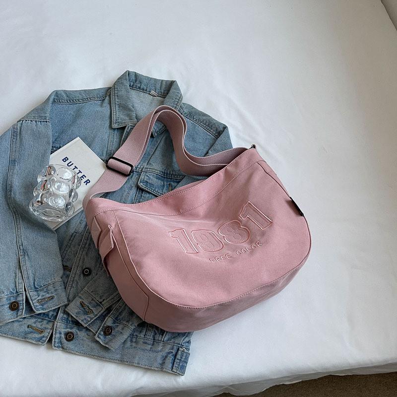 Вместительная сумка кроссбоди женская 2024 новый стиль универсальная студенческая сумка через плечо уличная мода холщовая сумка-пельмень черная розовый