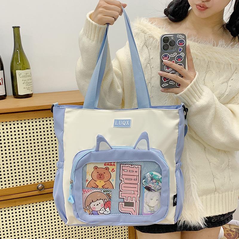 Urocza kosmetyczka w stylu college'owym, torebka 2025 nowa dziewczęca zaawansowana torba na ból, duża pojemność, torba tote na dojazdy