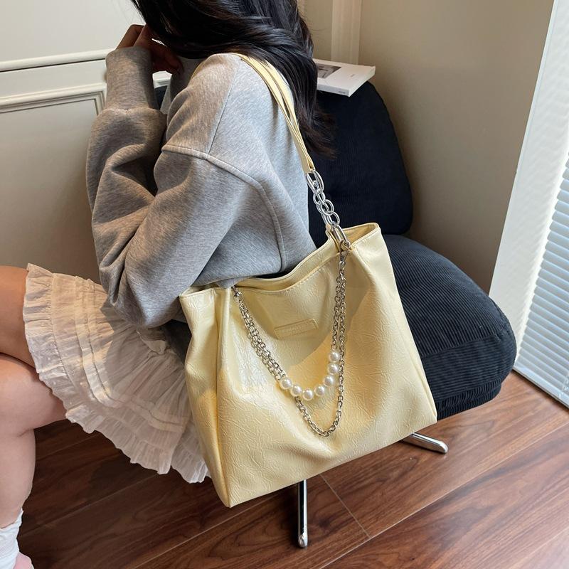Borsa a tracolla da underarm ultra-alla moda, di nicchia, minimalista, ad alta capacità, nuova borsa tote da pendolare