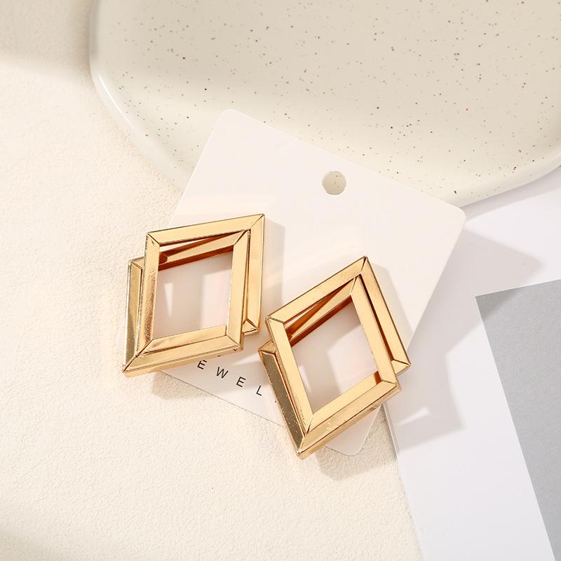 European and American jewelry simple fashion stud earrings texture double layer metal winding earrings geometric iron pipe earrings