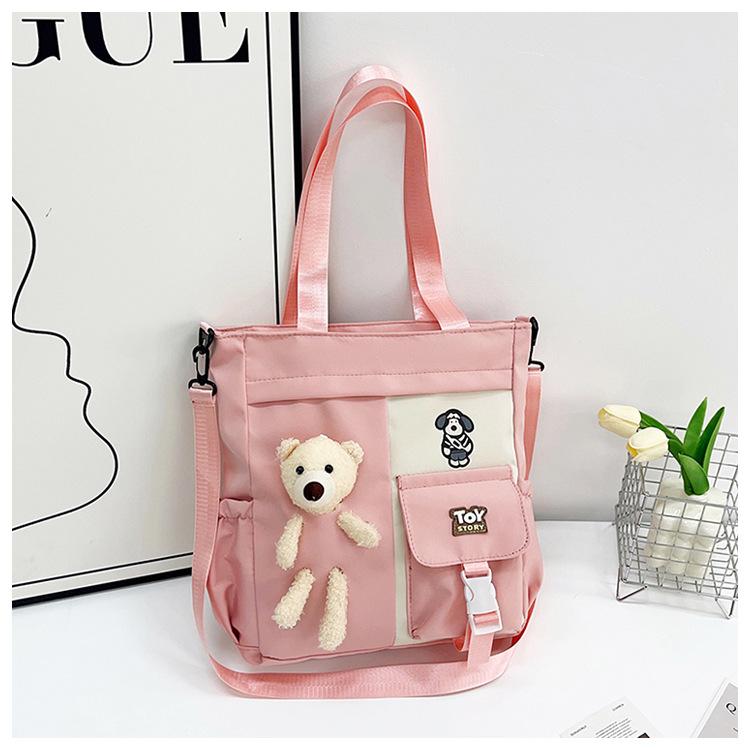 

Весна 2025 новая нейлоновая сумка-мессенджер на одно плечо, портативная сумка для учебников для средней школы, большая вместимость, косметичка розовый